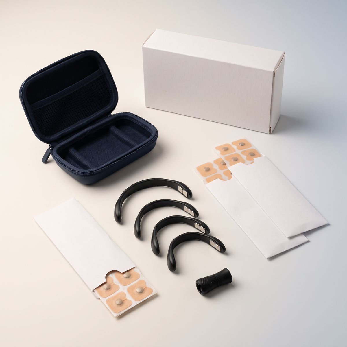 Magnetic nasal system kit: reusable bands, anchor tabs, applicator, travel case and refill sleeves